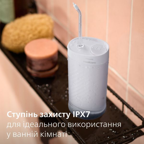 Іригатор Philips Sonicare Compact Flosser 1000 Purple HX3333/23 1470403ua фото