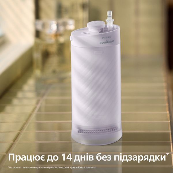 Іригатор Philips Sonicare Compact Flosser 1000 Purple HX3333/23 1470403ua фото